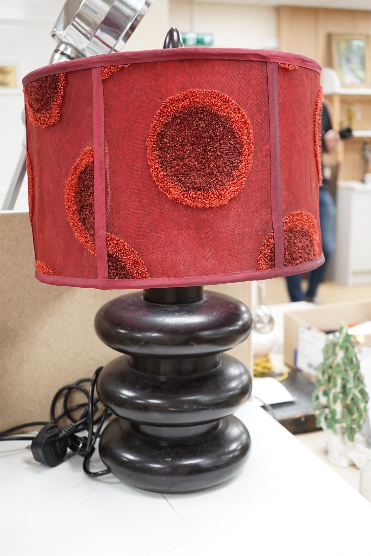 A pair of 1970's turned and ebonised wood table lamps, 57 cm high